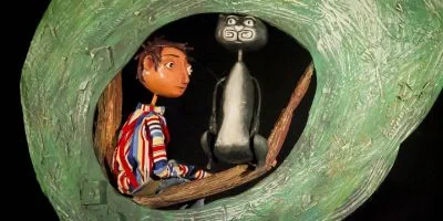 Colourful puppet and cat puppet in the Cat and Mouse programme image