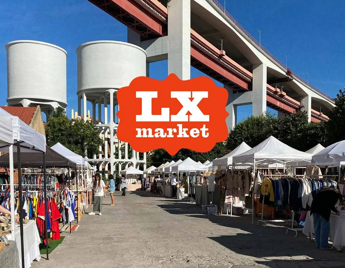 LX Market publicity image showing stalls under the bridge at LX Factory