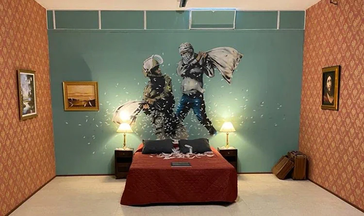 Museum display with a Banksy-themed room installation