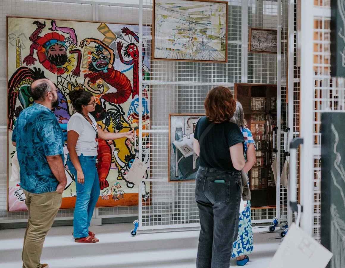 Visitors looking at artworks in CAM’s Open Storage