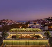 SEEN Sky Bar and Lisbon’s skyline at dusk