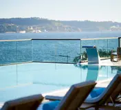 SUD Pool Lounge’s infinity pool above the Tagus