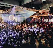 The crowd and DJ area inside Lux Frágil