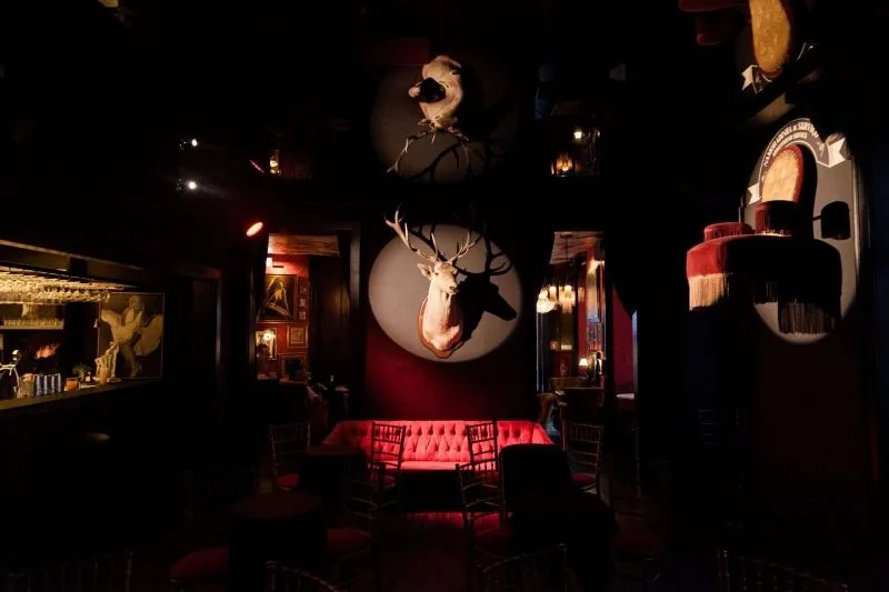 The decorated bar and seating inside Pensão Amor