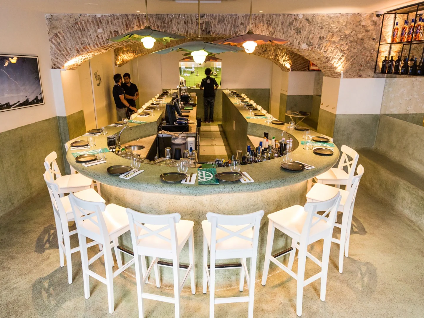 The curved dining counter and vaulted ceiling at Peixola