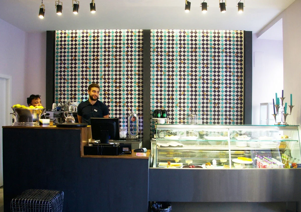 The café counter and dining space at Santelmo on Poço dos Negros