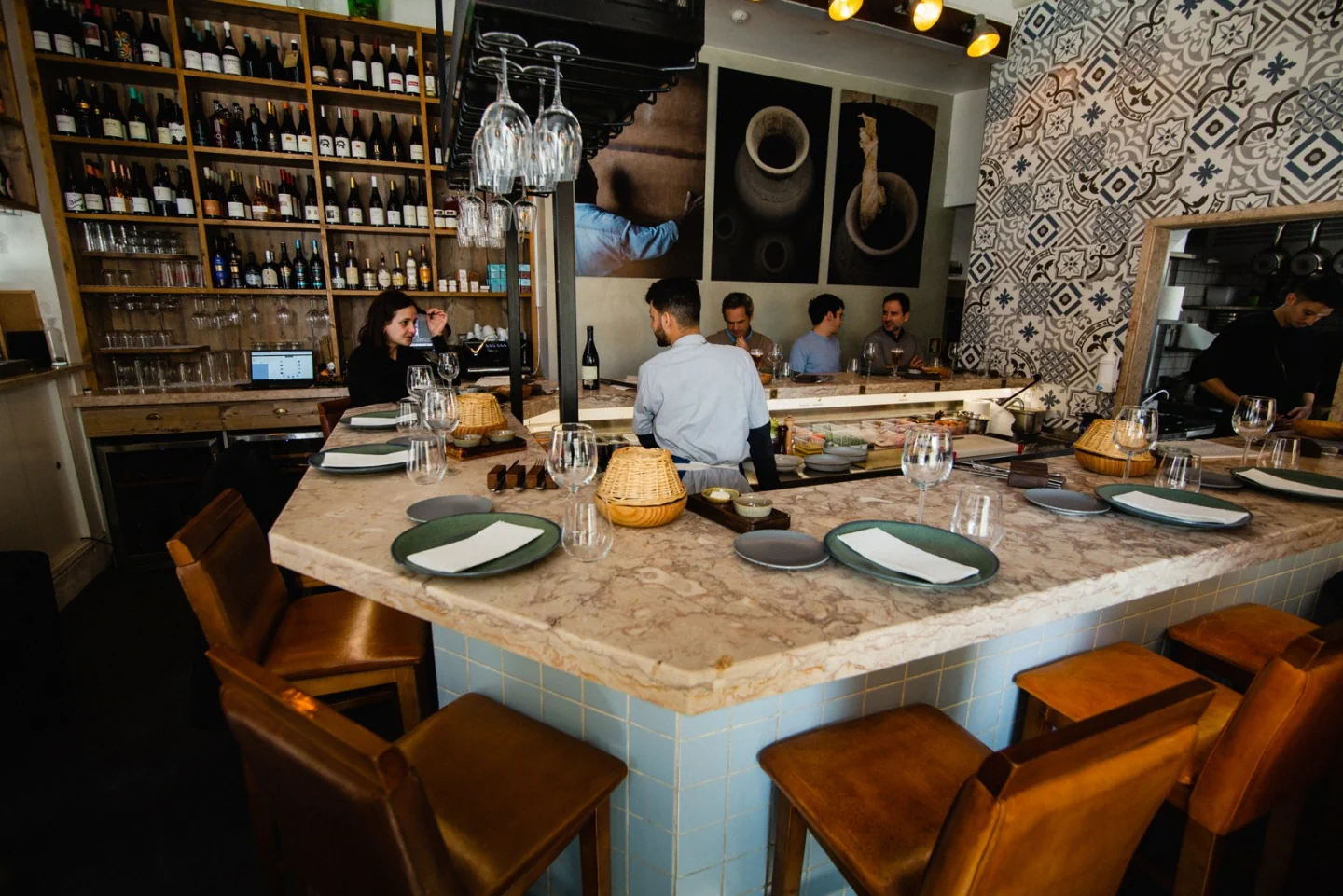 The dining counter and tiled walls inside O Frade in Ajuda